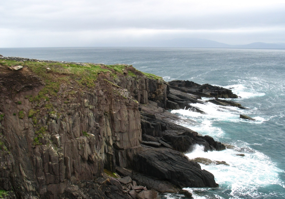 Image of cliffs and crashing waves